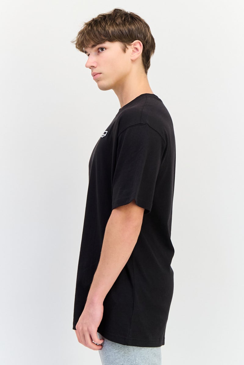 PUMA Men Relaxed Fit Short Sleeve Downtown Badge Outdoor T-Shirt, Black - Image 3